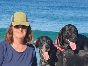 woman teaching dogs to leave it due to dog poisoning on northern beaches